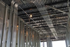 3-Med-Bldg-bent-pipe-through-ceiling-unfinishedJPG